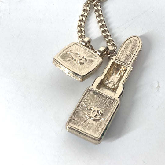 CHANEL Necklace metal gold 22C CC COCO Mark Rhinestone Lipstick Women Used Authentic