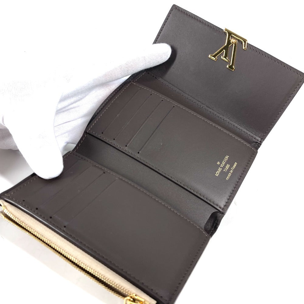LOUIS VUITTON Trifold wallet M62159 Taurillon Clemence Leather beige Portefeuille Compact Women Used Authentic