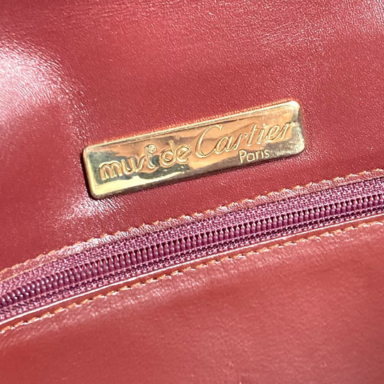 CARTIER Clutch bag leather Bordeaux logo Must Line unisex(Unisex) Used Authentic