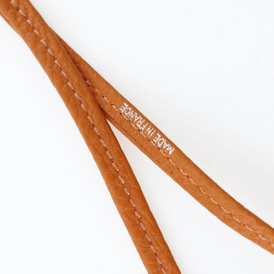 HERMES Other fashion goods Metal, Leather Orange / Silver Pendant Shifure Ultrasonic whistle Women Used Authentic