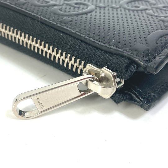 GUCCI Coin case 657571 leather black GG emboss L-shaped fastener mens Used Authentic