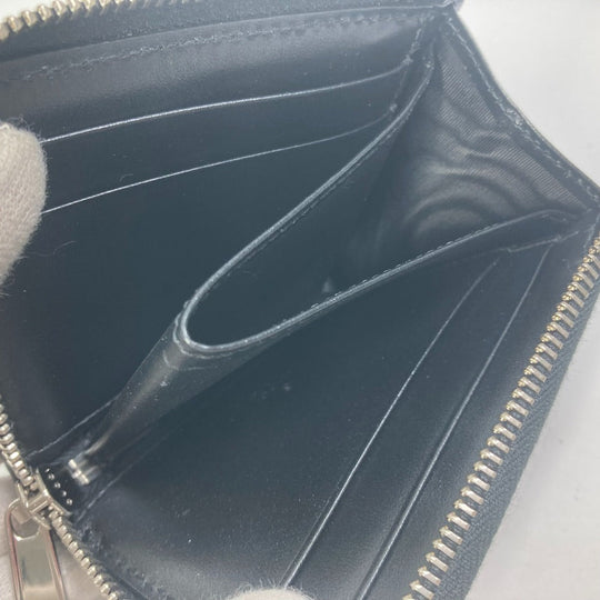 GUCCI Coin case 657571 leather black GG emboss L-shaped fastener mens Used Authentic