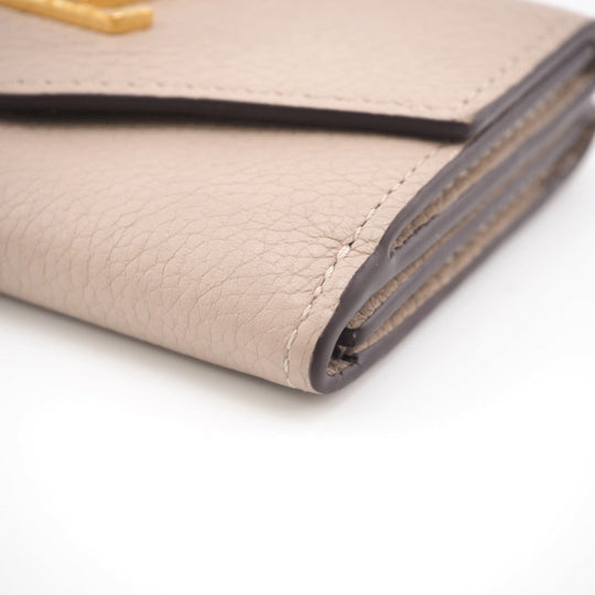 LOUIS VUITTON Tri-fold wallet M69340 Taurillon Clemence beige Taurillon Clemence Portefeuille Lock Mini Women Used Authentic