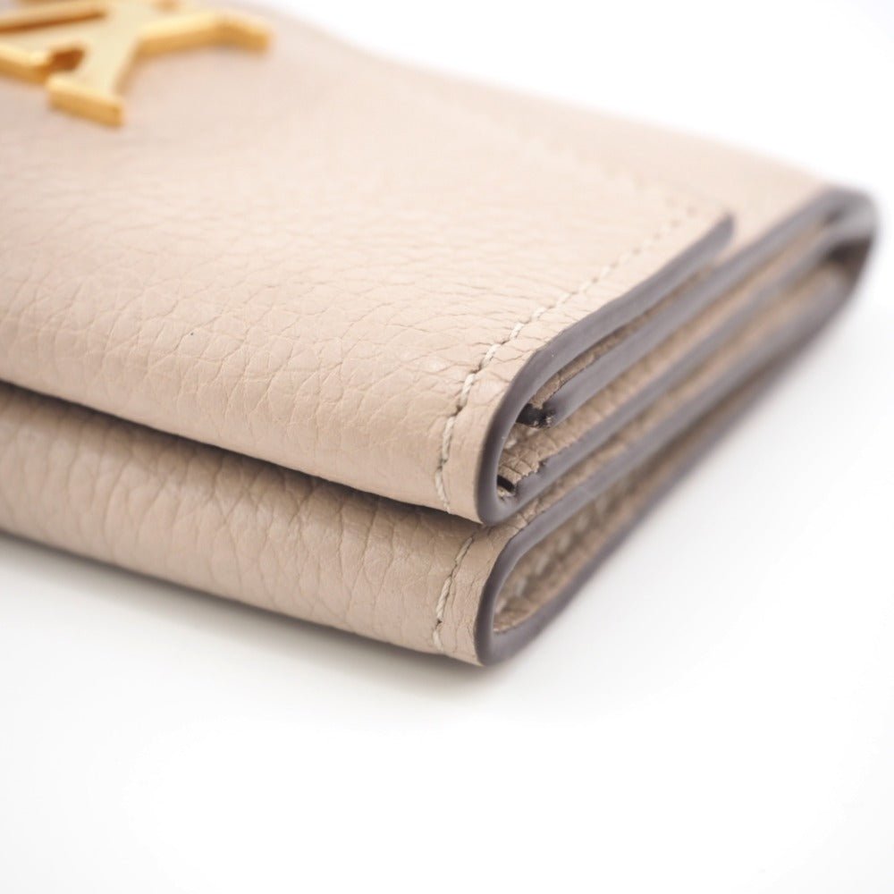 LOUIS VUITTON Tri-fold wallet M69340 Taurillon Clemence beige Taurillon Clemence Portefeuille Lock Mini Women Used Authentic