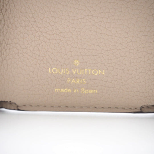 LOUIS VUITTON Tri-fold wallet M69340 Taurillon Clemence beige Taurillon Clemence Portefeuille Lock Mini Women Used Authentic