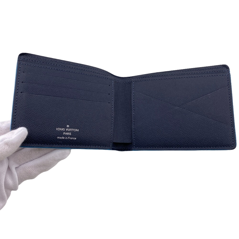 LOUIS VUITTON Bill Compartment M30381 leather Navy Taiga Portefeuille Multripru mens Used Authentic