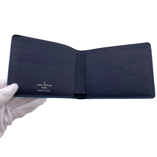 LOUIS VUITTON Bill Compartment M30381 leather Navy Taiga Portefeuille Multripru mens Used Authentic