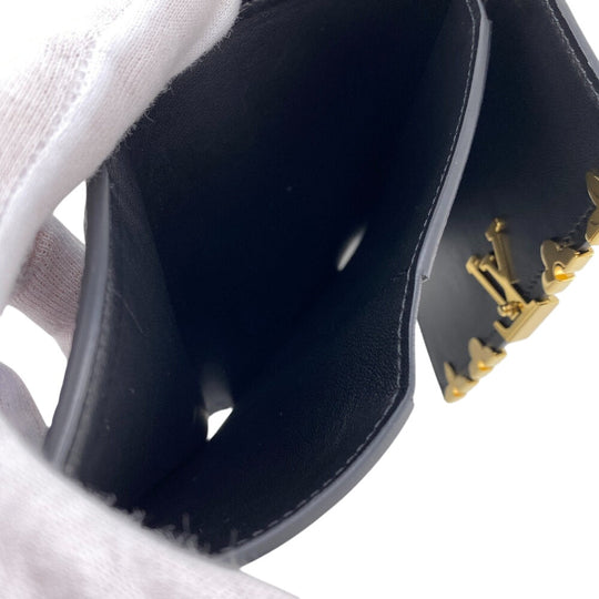 LOUIS VUITTON Tri-fold wallet M82764 leather black Compact wallet Portefeuille Capucines Compact Women Used Authentic
