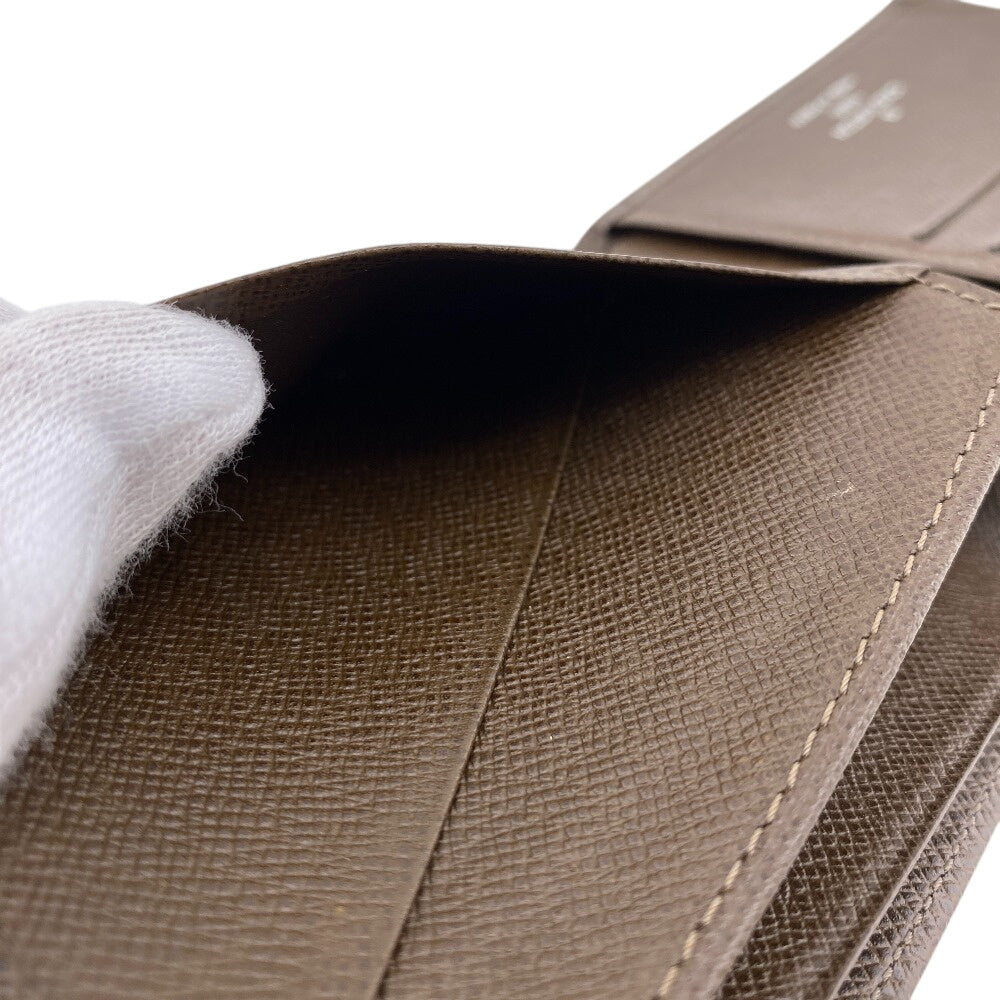 LOUIS VUITTON Bill Compartment M32810 leather Brown Taiga Portefeuille Multripru mens Used Authentic
