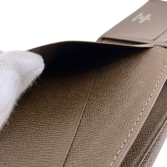 LOUIS VUITTON Bill Compartment M32810 leather Brown Taiga Portefeuille Multripru mens Used Authentic