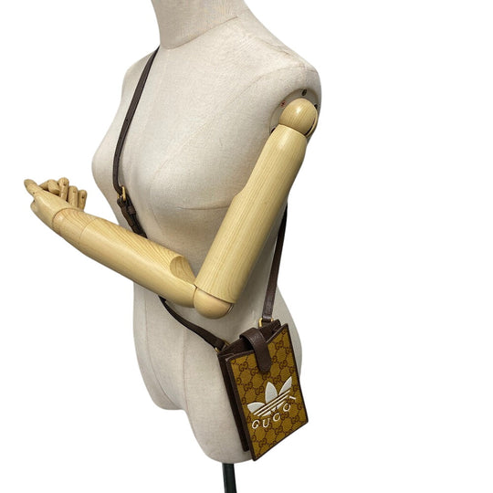 GUCCI Shoulder Bag 702203 Coated canvas Brown Adidas GG crystal Phone case mens(Unisex) Used Authentic