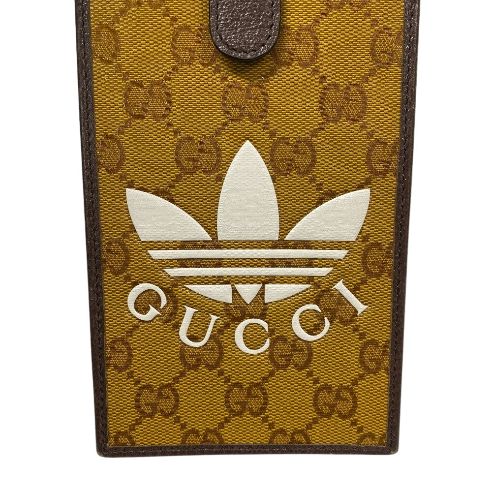 GUCCI Shoulder Bag 702203 Coated canvas Brown Adidas GG crystal Phone case mens(Unisex) Used Authentic