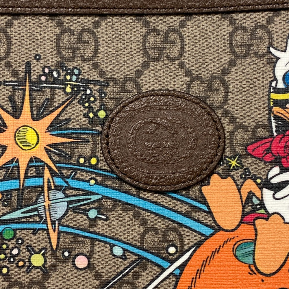 GUCCI Clutch bag 647925 PVC, Leather Brown Disney Donald GG Supreme mens(Unisex) Used Authentic