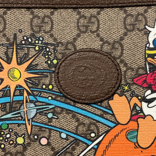 GUCCI Clutch bag 647925 PVC, Leather Brown Disney Donald GG Supreme mens(Unisex) Used Authentic