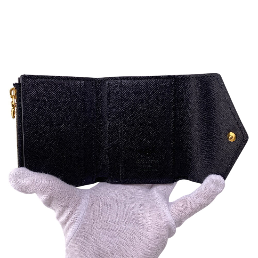 LOUIS VUITTON Tri-fold wallet MI4200 leather Ivory Monogram Game on Portefeuille Zoe Women Used Authentic