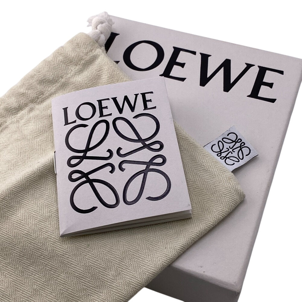LOEWE Coin case leather green Fragment puzzle Women Used Authentic