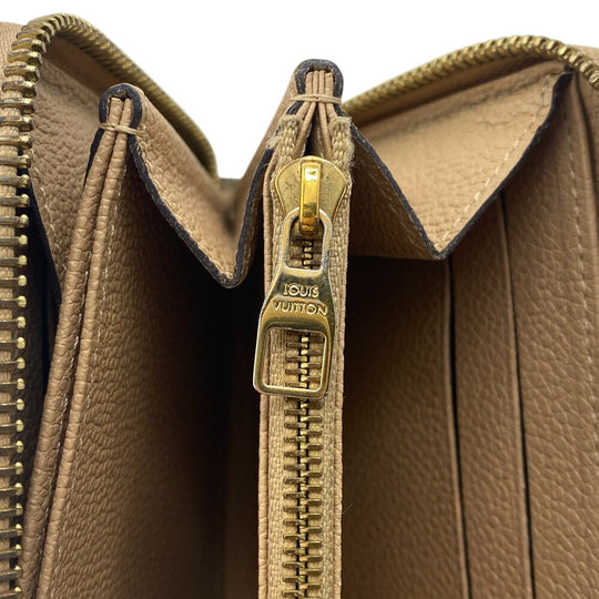 LOUIS VUITTON Long Wallet Purse M69034 leather beige Monogram Unplant Zippy wallet mens(Unisex) Used Authentic