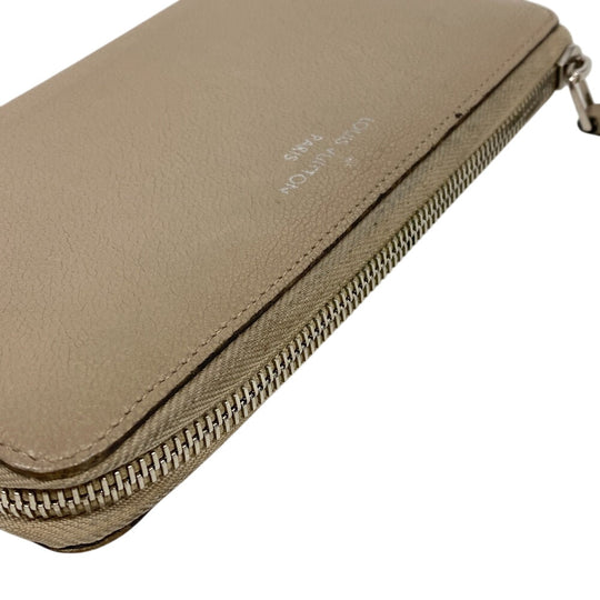 LOUIS VUITTON Long Wallet Purse leather beige L-shaped zipper Portefeuille M60147 Comet Parnassus Women Used Authentic