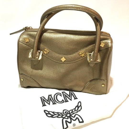 MCM Handbag leather gold Logo studs Women Secondhand Authentic