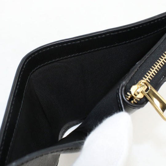 GUCCI 772639 0OP0N 1000 Bi-fold wallet Gucci Script Mini U-shaped zipper wallet leather black unisex